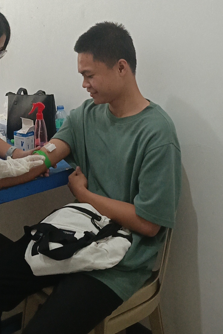 Neil Anthony R. Adame with college friends during medical exam
