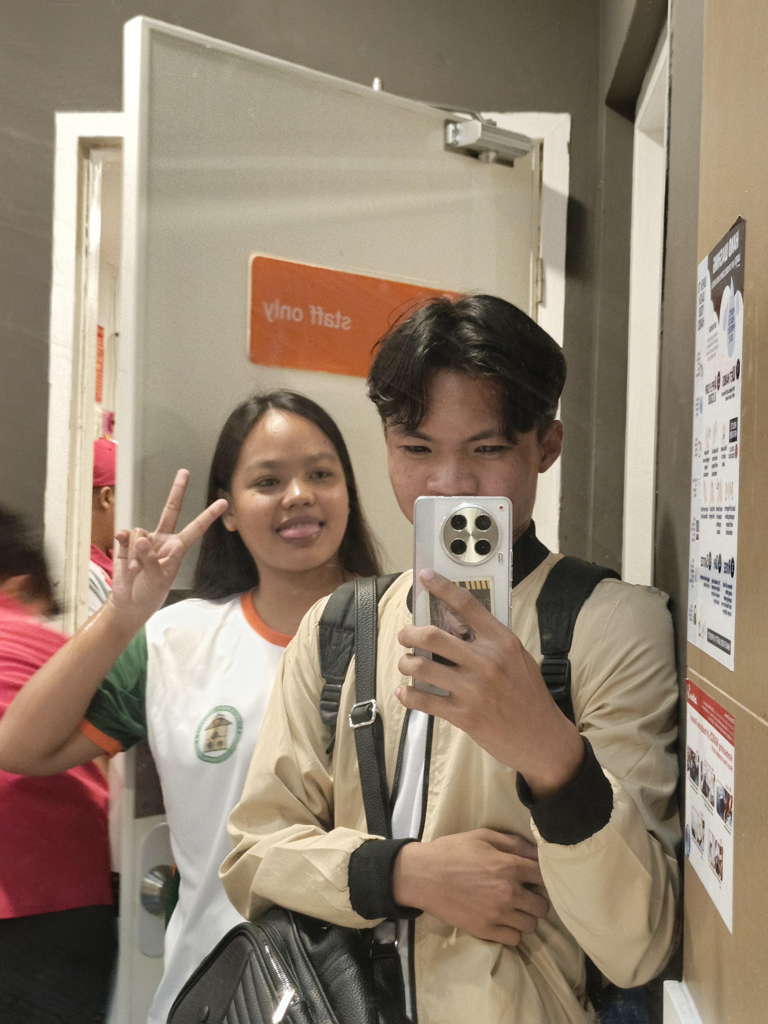 Neil Anthony R. Adame with 12th grade friend at Jollibee
